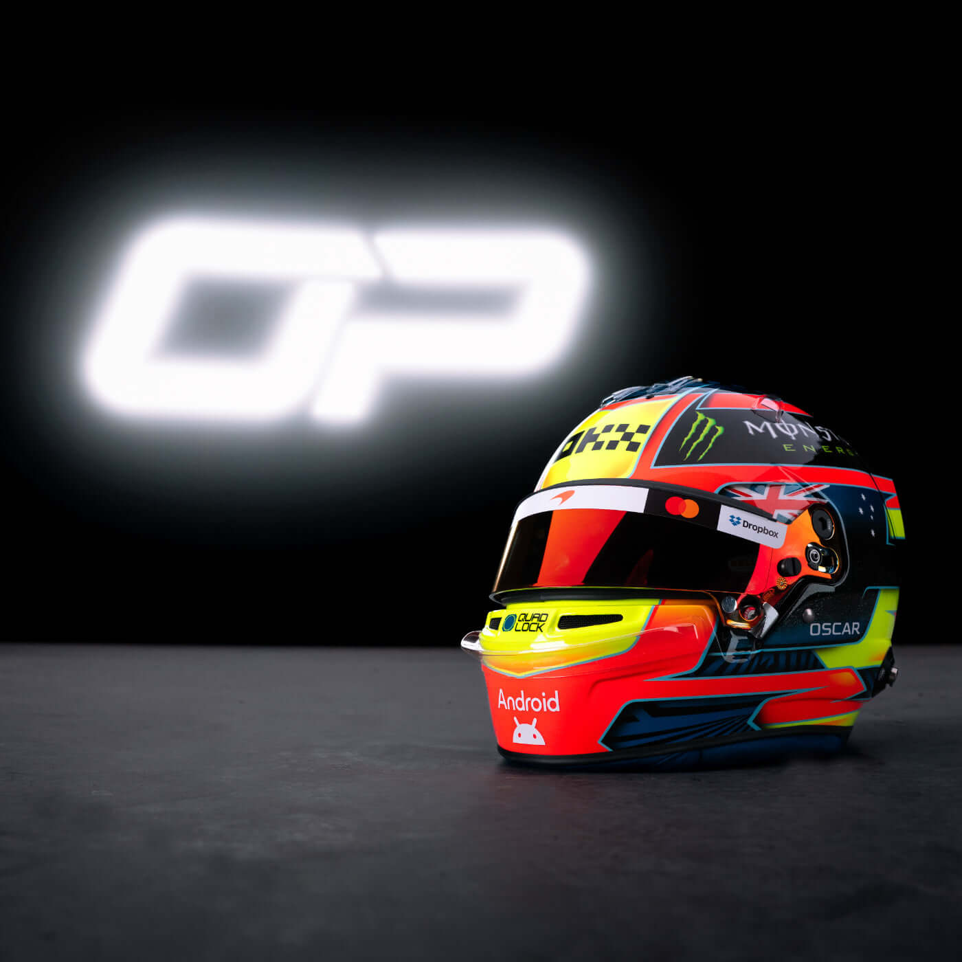 Colorful racing helmet with sponsor logos, displayed in front of a glowing OP logo on a dark background.