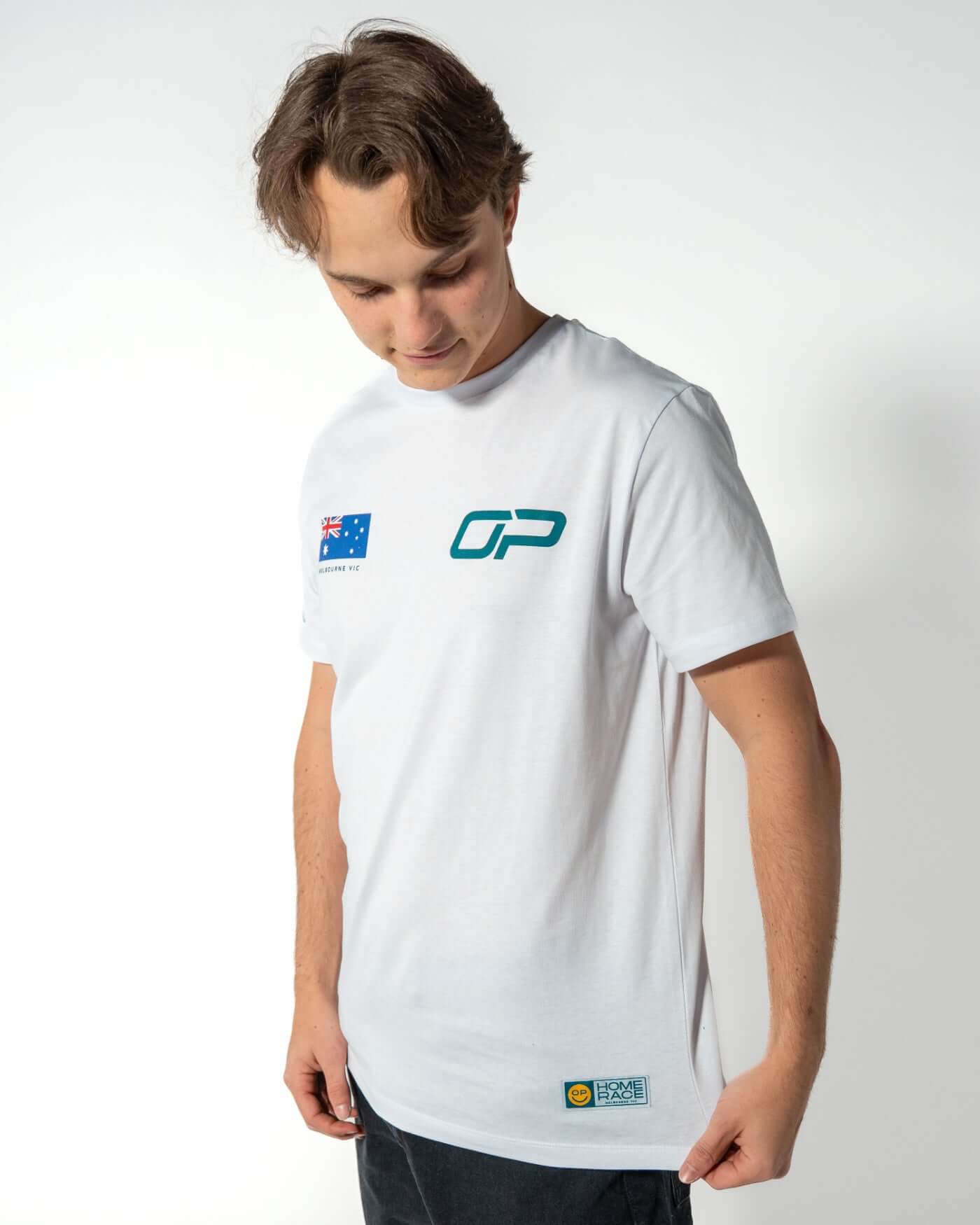 Home Race '26 T-Shirt - White worn by Oscar showcasing Australian flag and OP smiley icon