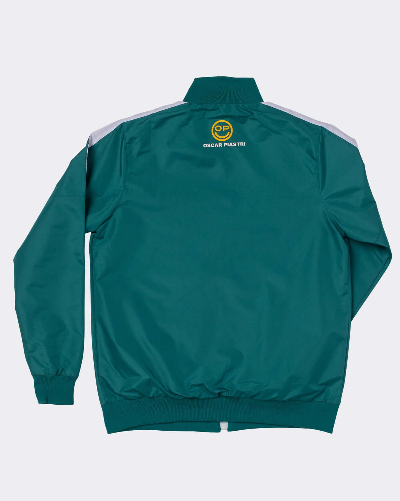 Back view of Home Race '26 Race Jacket showcasing the green and gold design and OP smiley accents.