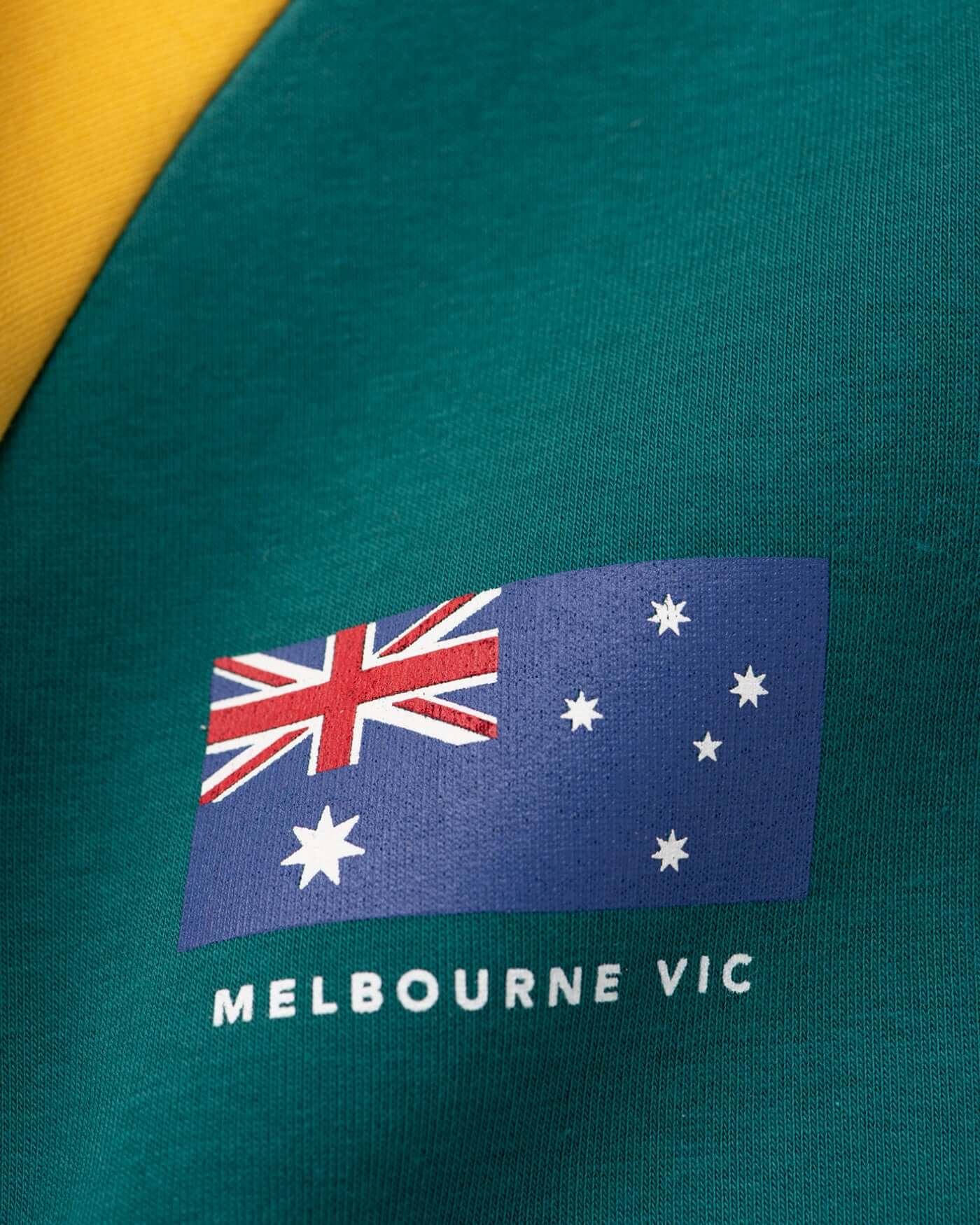 Home Race '26 Sweater featuring the Australian flag and Melbourne VIC text.