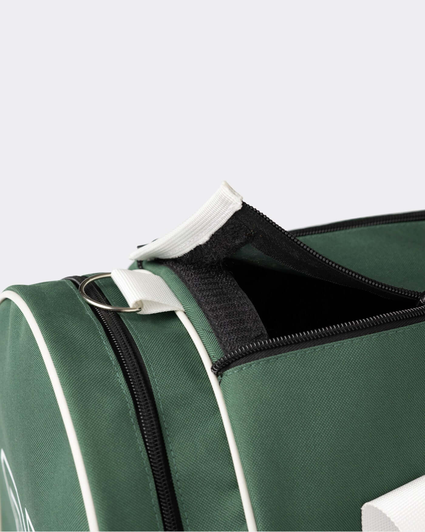 Close-up of the Home Race Barrel Bag showing the zipper and secure fastening, perfect for everyday adventures.