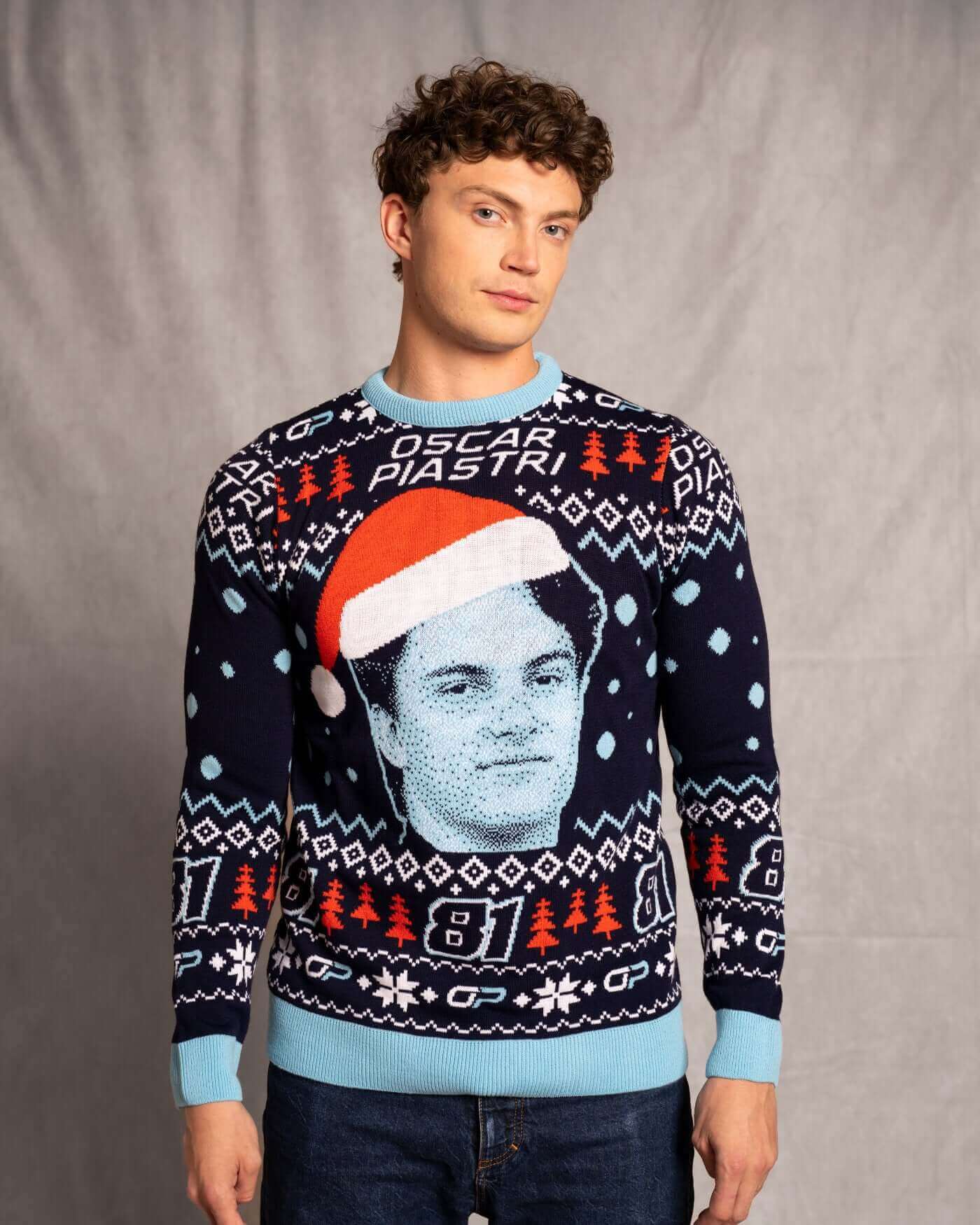 Festive Oscar Piastri Christmas sweater with holiday patterns and Oscar's face, perfect for cozy holiday celebrations.