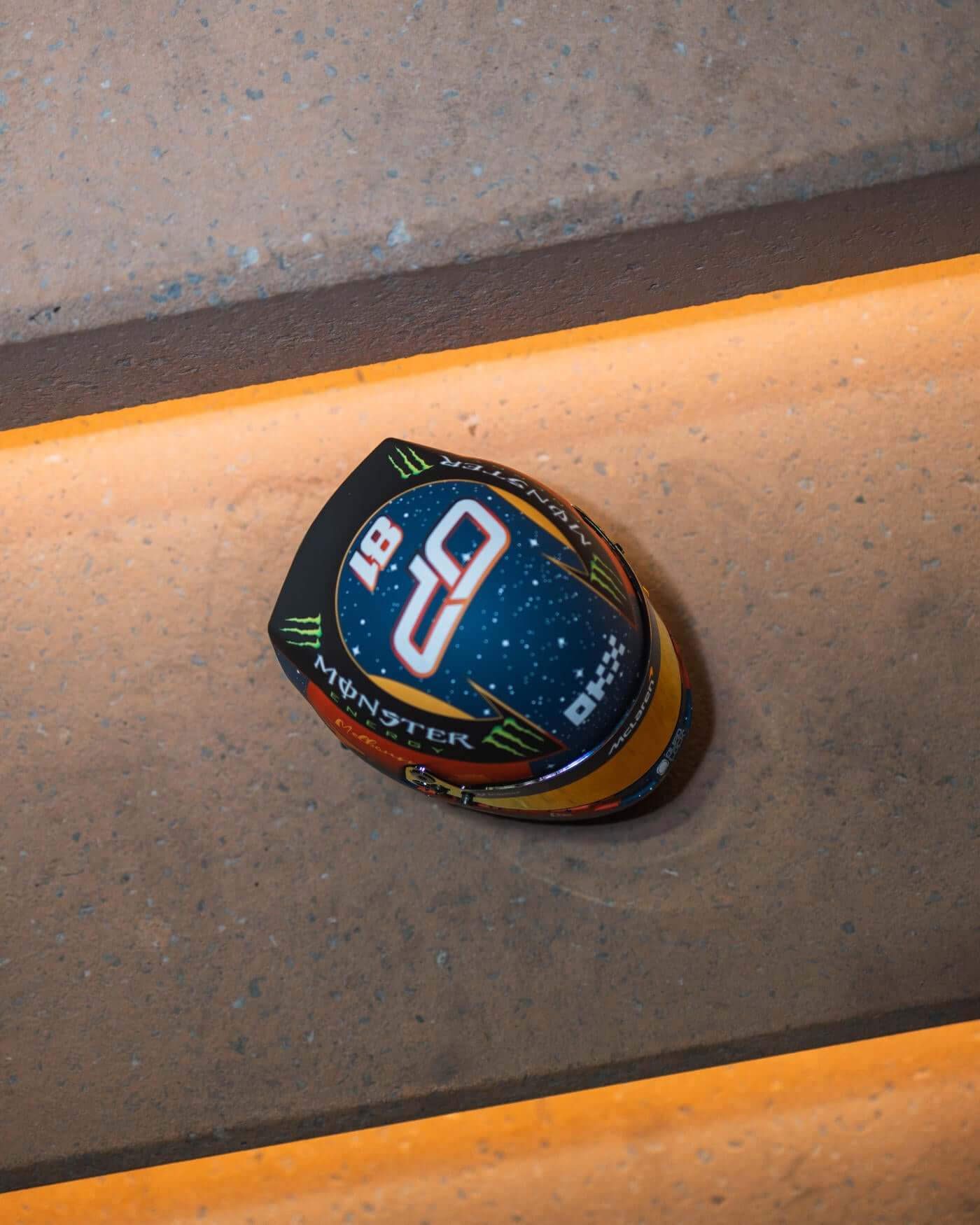 1:2 scale 2024 Australia Grand Prix mini helmet with Oscar Piastri's racing number and outback design by Bell.