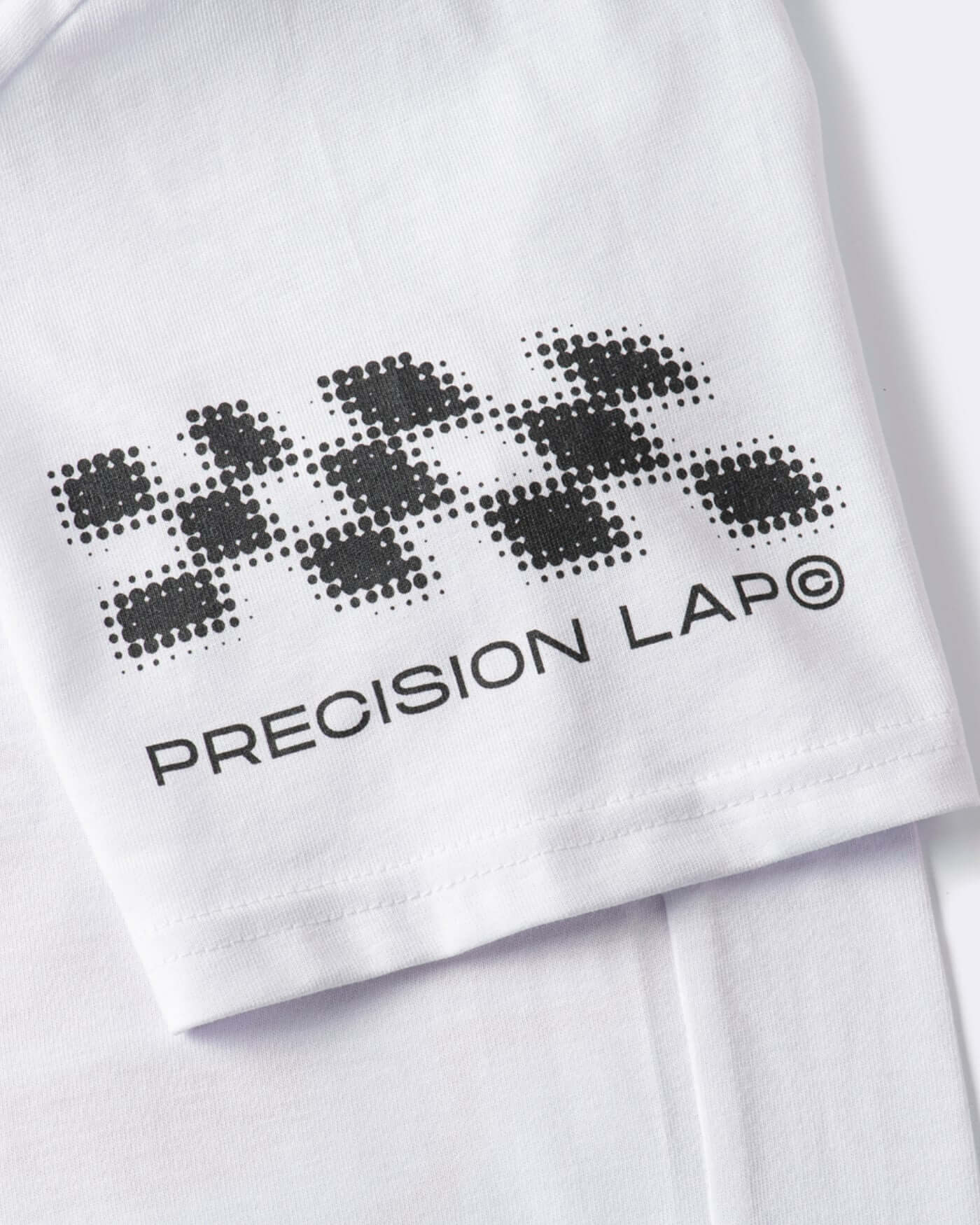Origins T-Shirt - White featuring bold PRECISION LAP graphics on the sleeve for a retro motorsport look.
