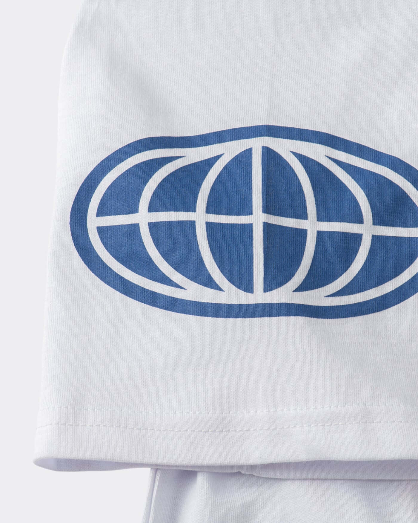 Origins T-Shirt - White close-up view of blue OP81 graphic on crisp white fabric