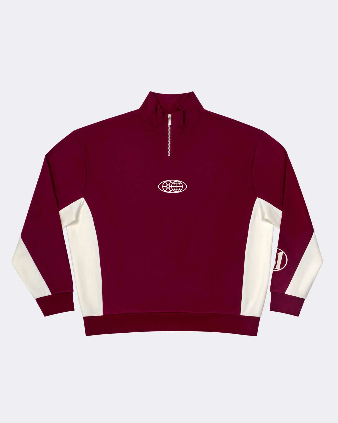 World Circuit Quarter Zip - Burgundy featuring a burgundy body with contrast off-white side panels.