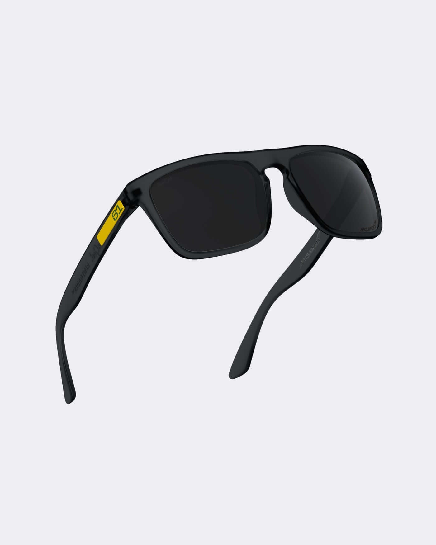 Limited Edition McLaren F1 Oscar Piastri SunGod Renegades sunglasses with black frames and 8KO® smoke lenses.