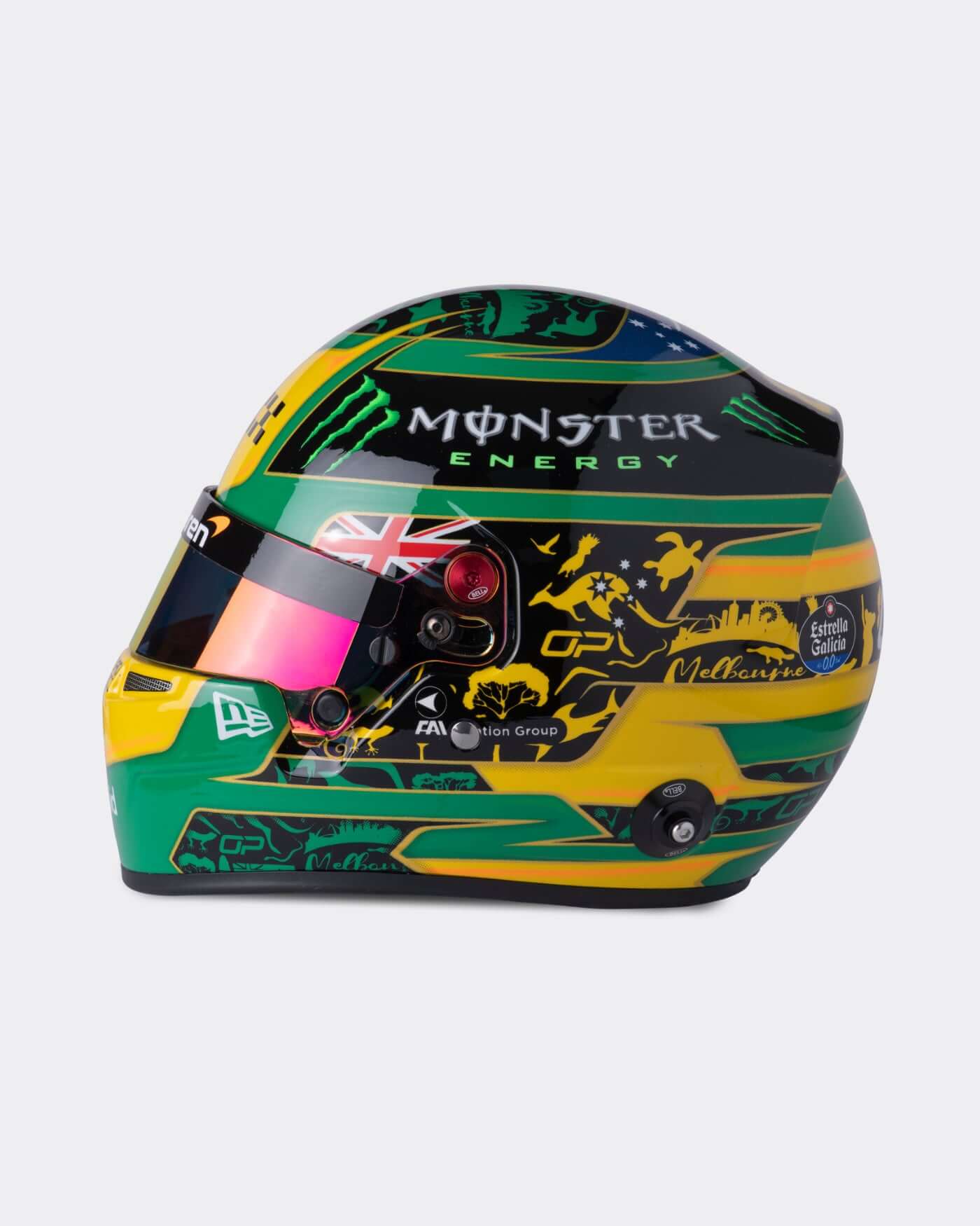 1:2 scale replica of Oscar Piastri's 2025 F1 Australian Grand Prix helmet, featuring vibrant green and yellow colors.