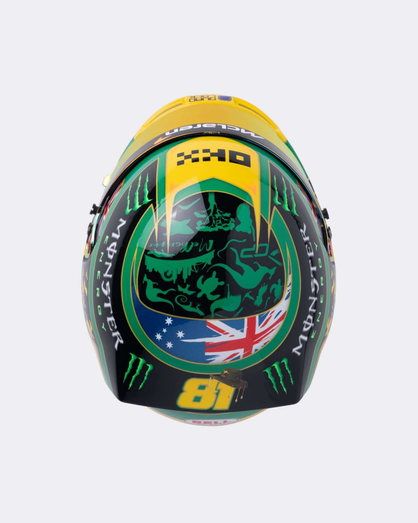 2025 Australia helmet top view, featuring Oscar Piastri's #81, Australian flag, and vibrant green-yellow design.