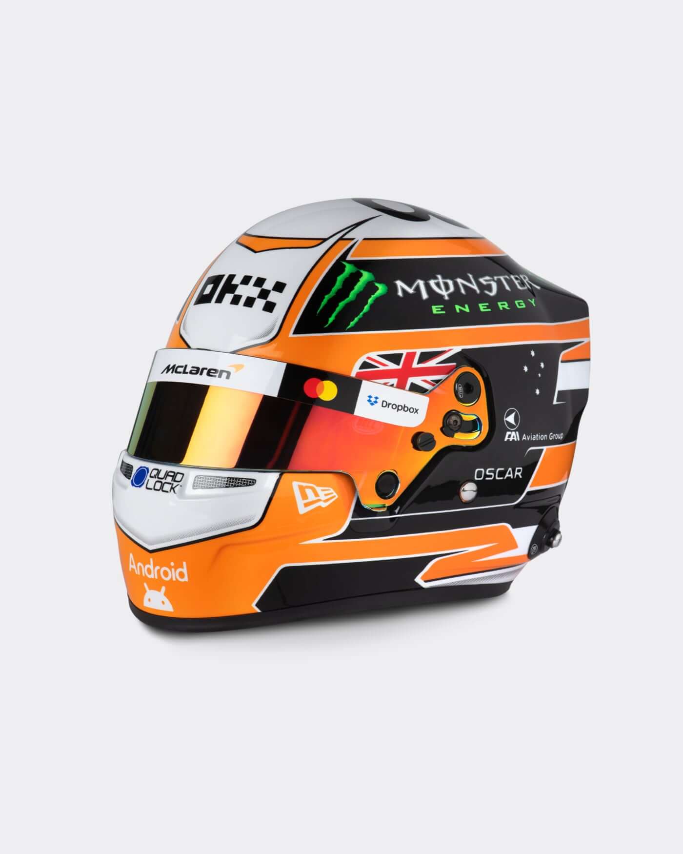 1:2 scale replica of Oscar Piastri's 2025 Monaco Grand Prix helmet featuring iconic papaya colors.