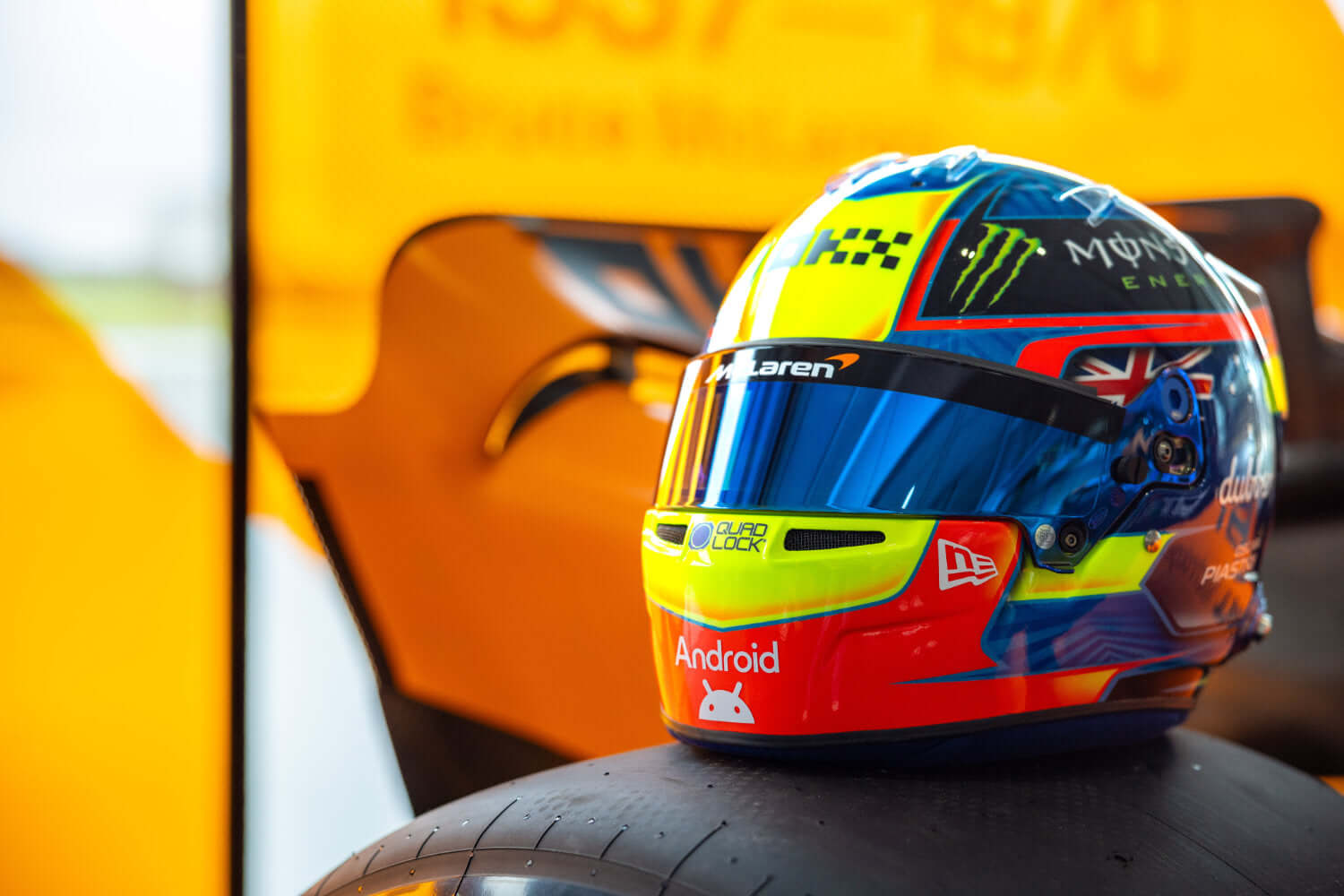 How does Oscar design his race helmets?