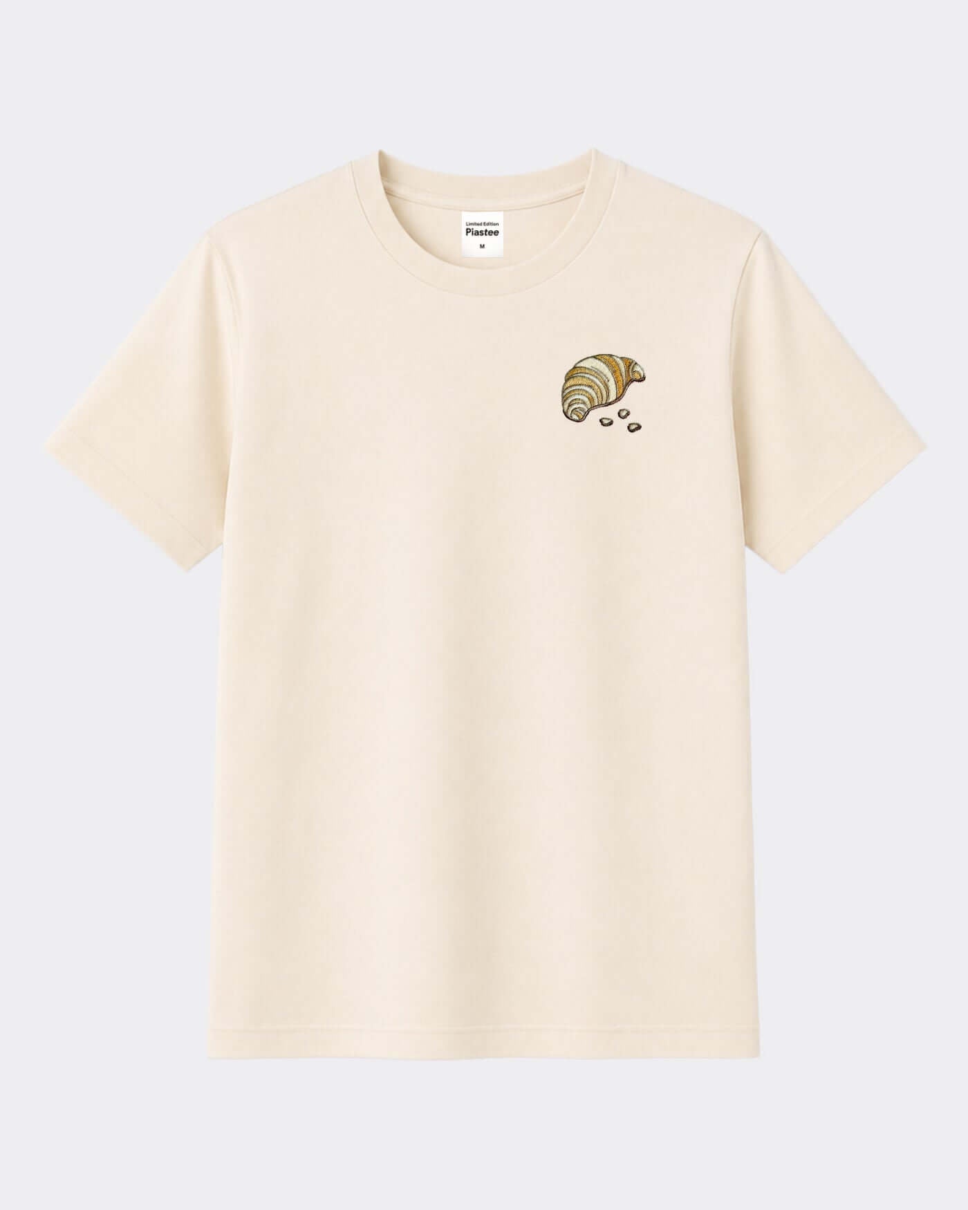 The Pastry Piastee t-shirt featuring a croissant design, short sleeves and a regular fit for all seasons.