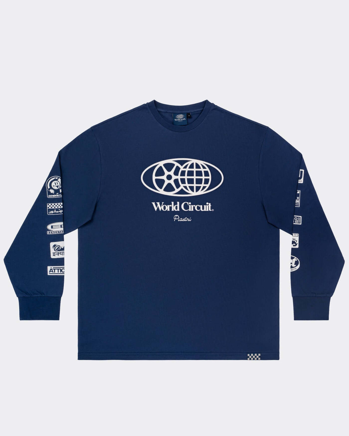 World Circuit Long Sleeve T-Shirt - Blue featuring emblem, graphics, and ribbed collar.