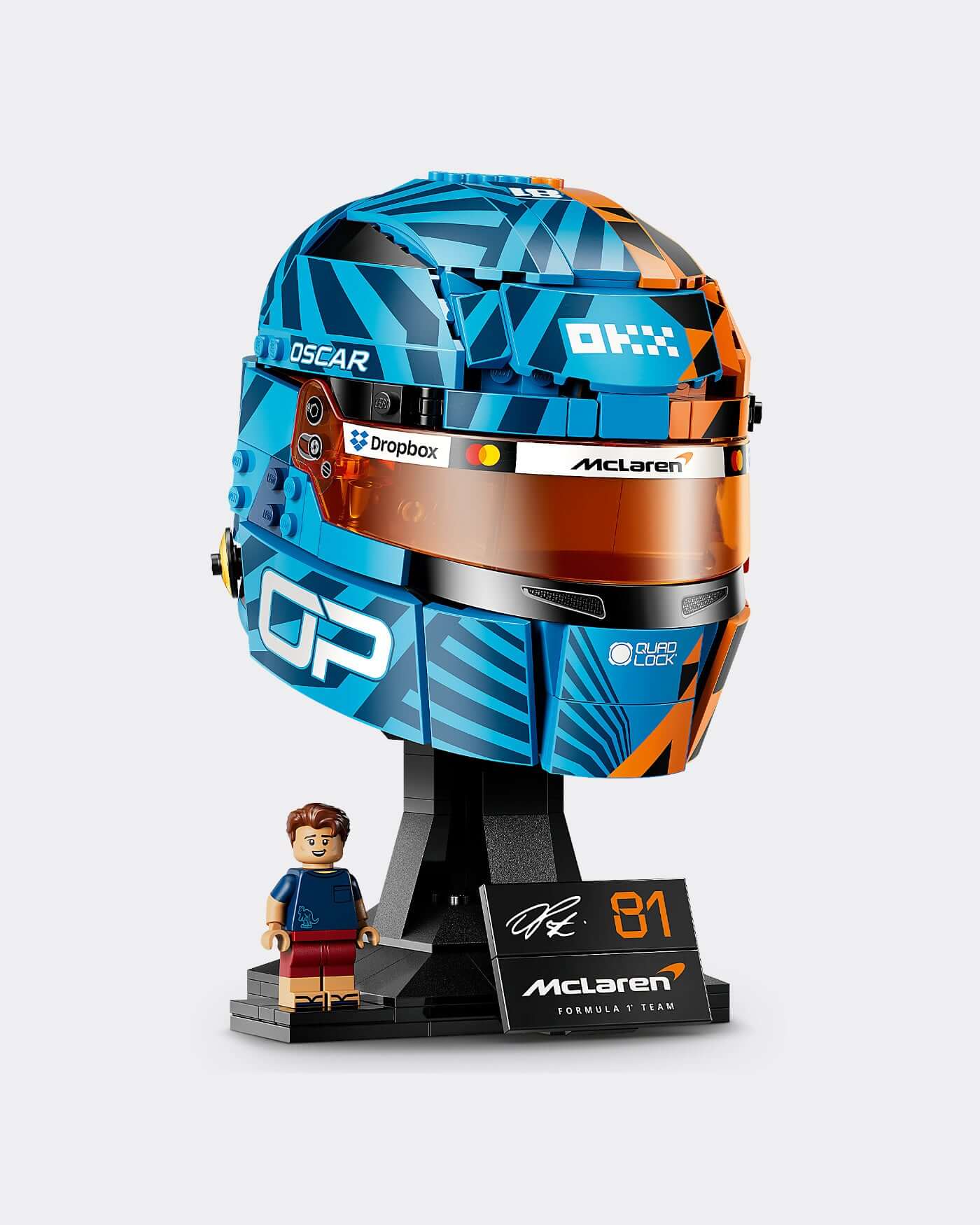 LEGO® Editions McLaren Mastercard F1® Team Oscar Piastri Helmet displayed with a minifigure and vibrant design.