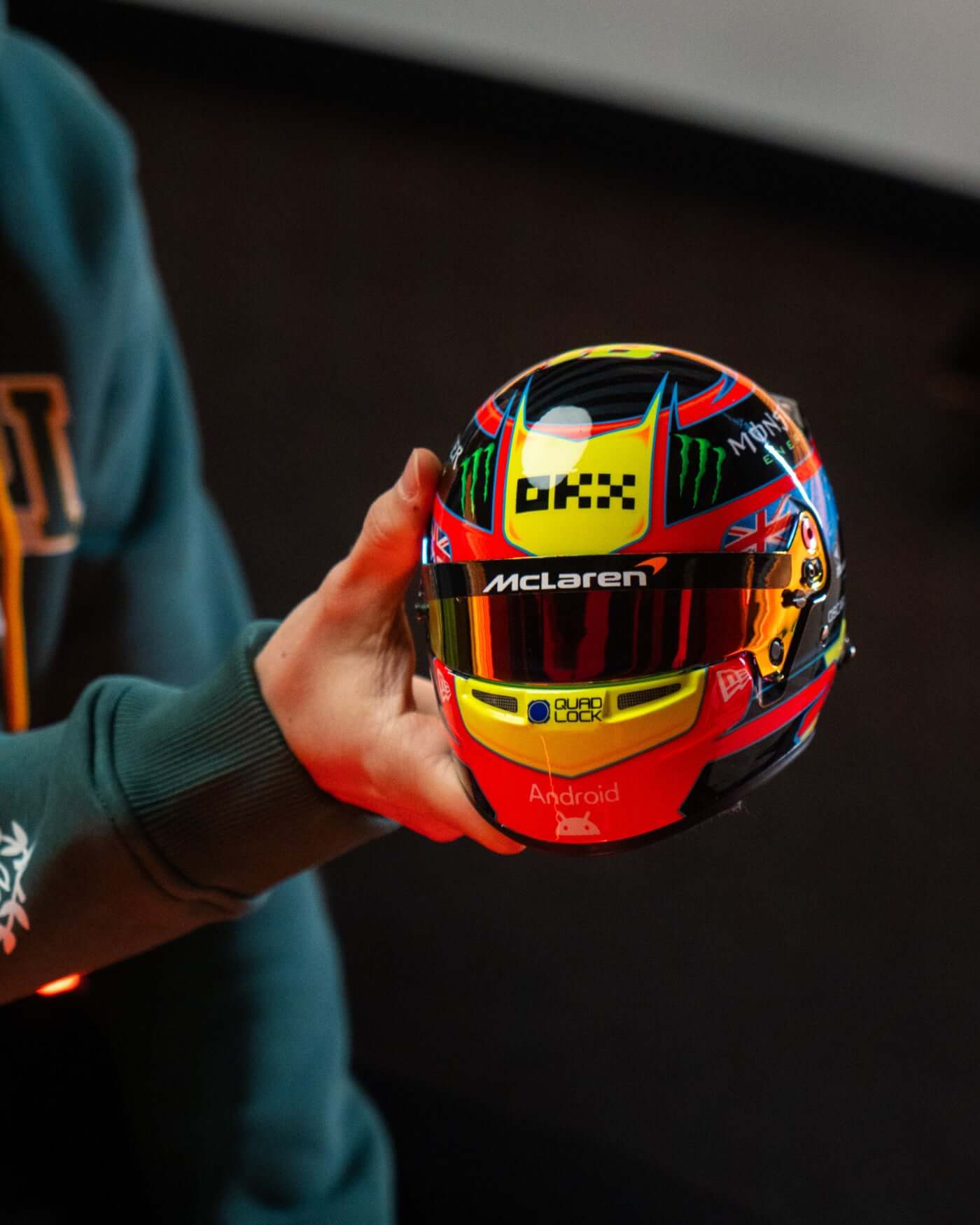 1:2 scale replica of Oscar Piastri's 2025 F1 helmet with colorful design and McLaren branding.