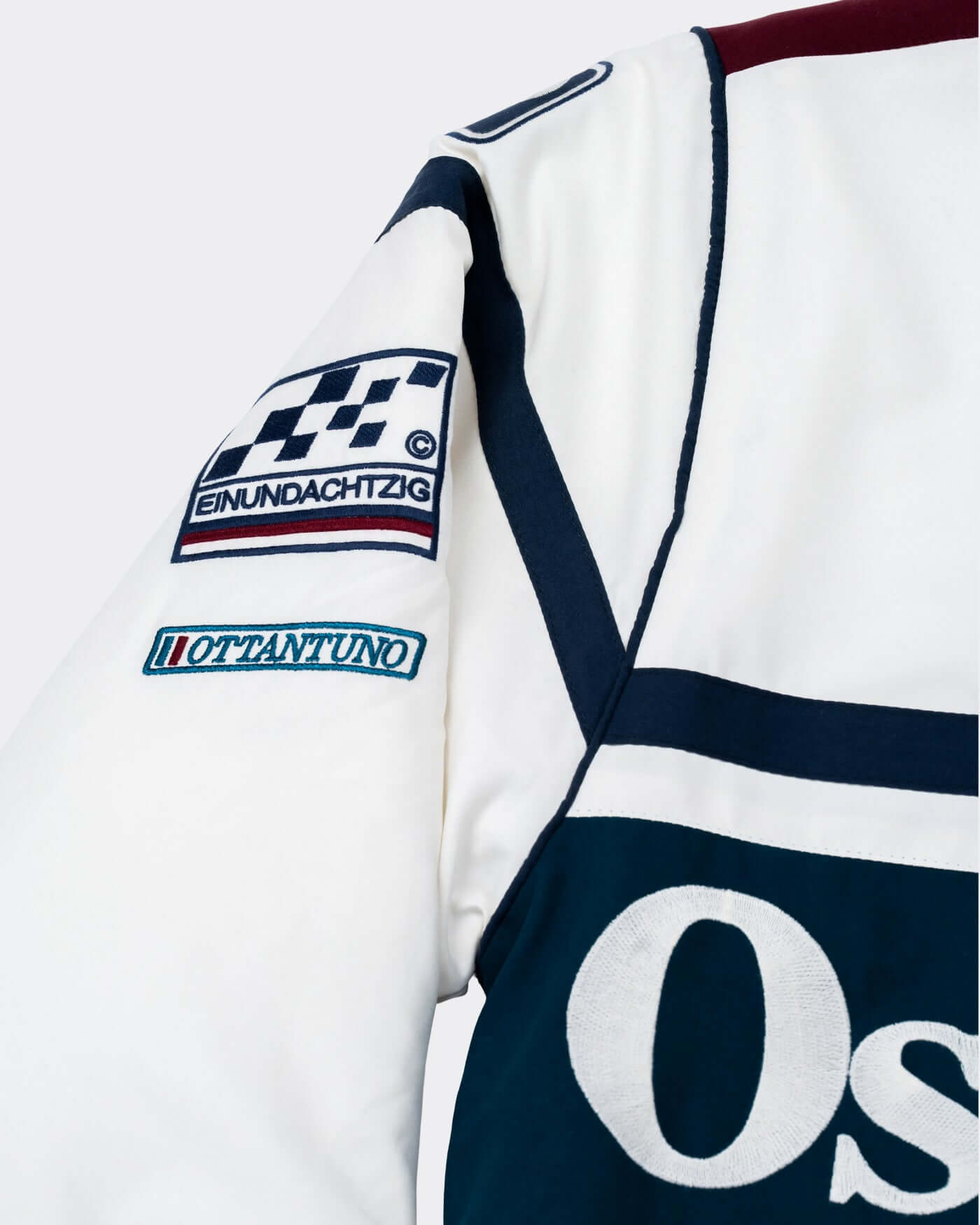 World Circuit Race Jacket featuring embroidered badges and contrast piping on the sleeve.
