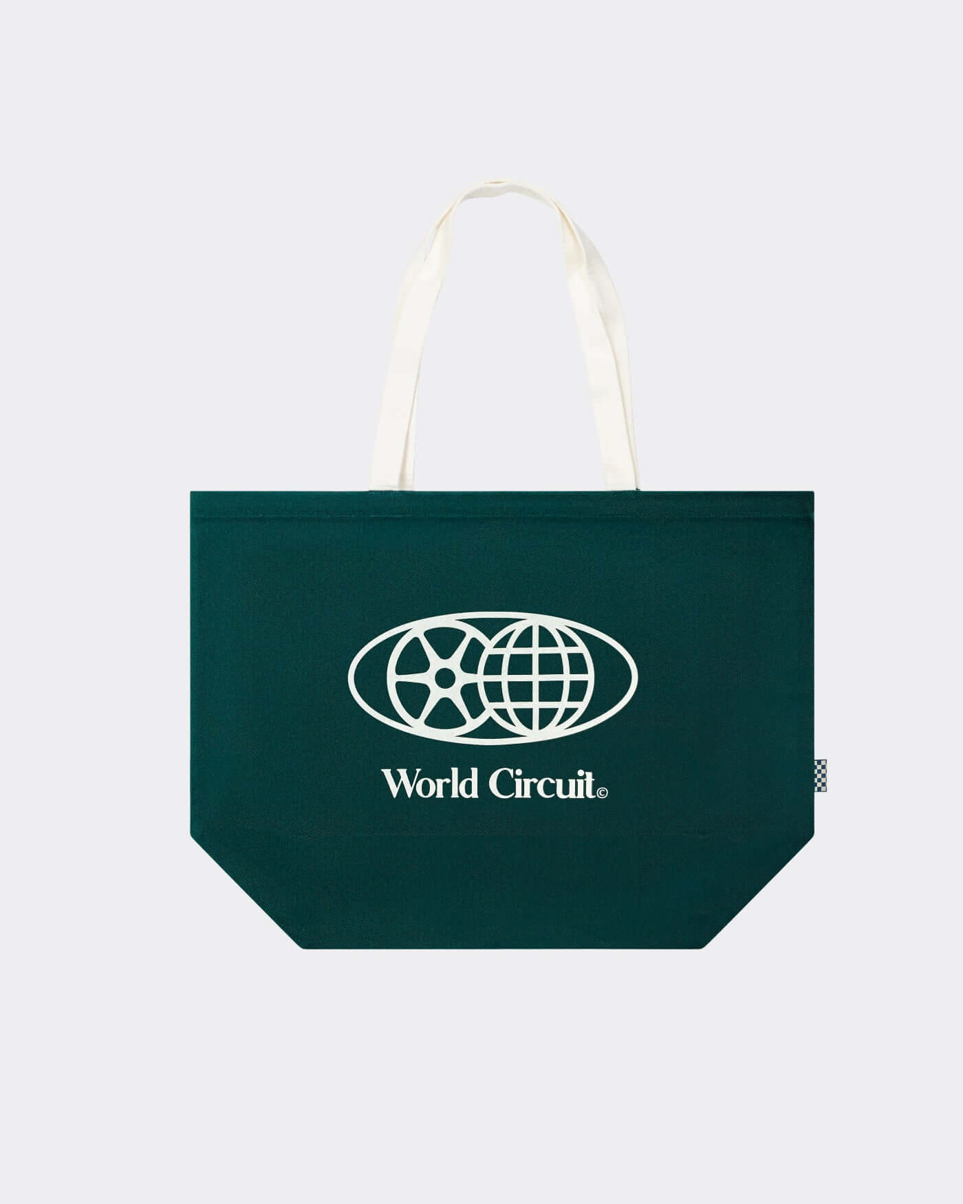 World Circuit Tote Bag in dark green cotton canvas with globe emblem and World Circuit lettering.
