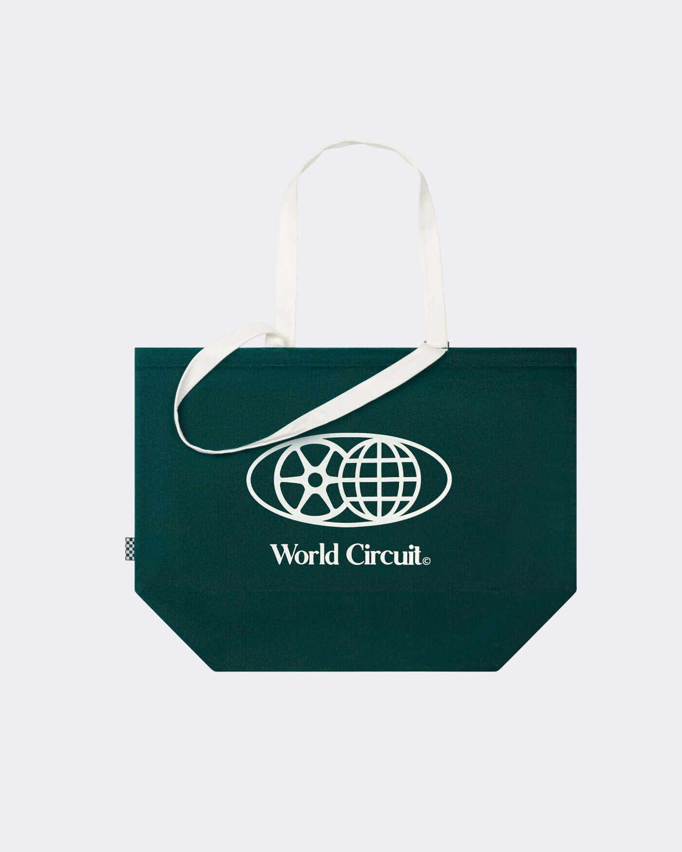 World Circuit Tote Bag in dark green, featuring globe emblem and World Circuit lettering on sturdy canvas.