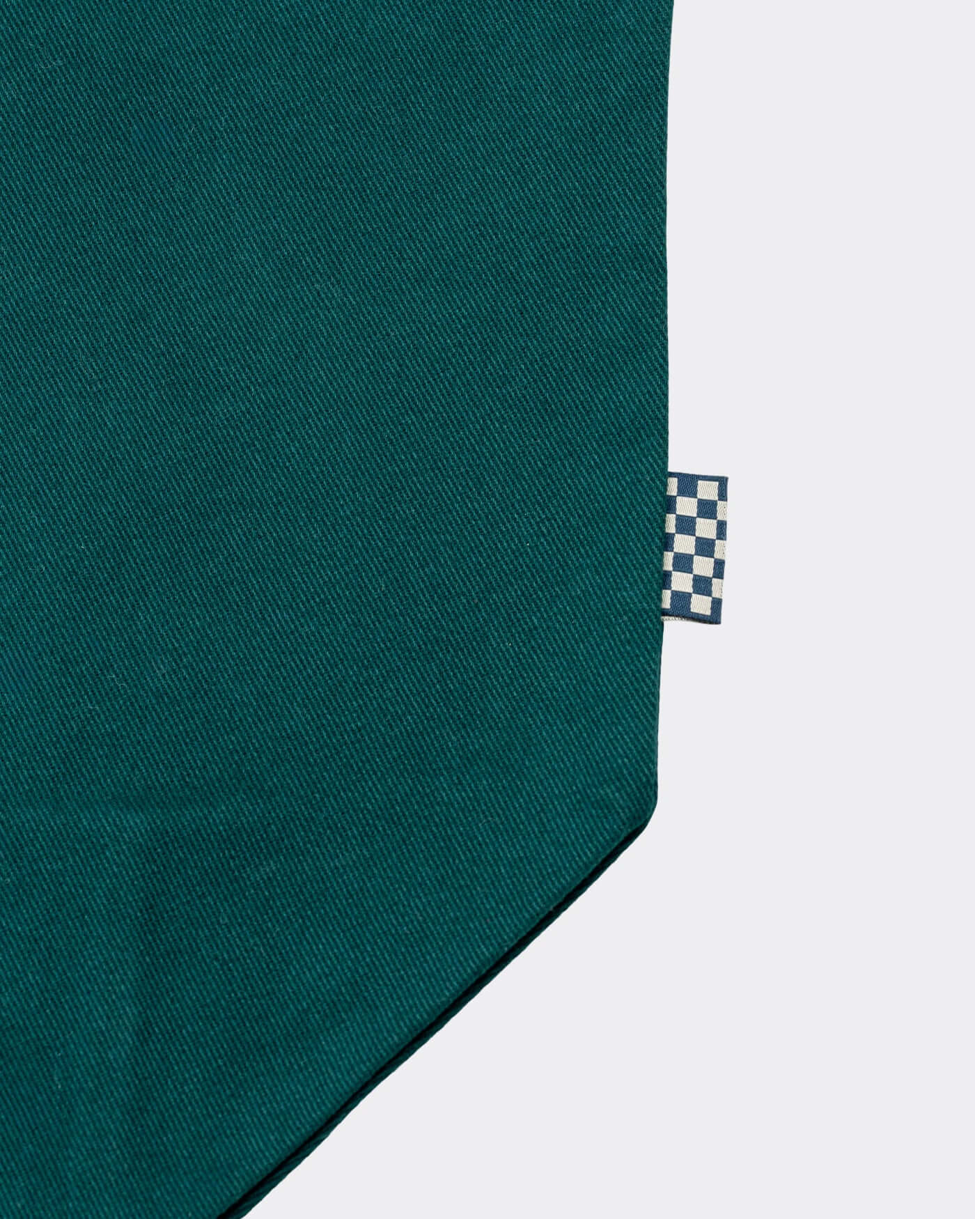 Close-up of the fabric detail on the World Circuit Tote Bag, showcasing its cotton canvas and reinforced stitching.